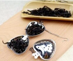 Merkloos RVS Thee Ei Hartje | Theefilter Mannetje | Losse Theezeef | Kruidenhart | Zeef | Tang | Infuser | Thee Ei | RVS | 1 Stuks -Koffie Kortings Winkel 1200x1010 1